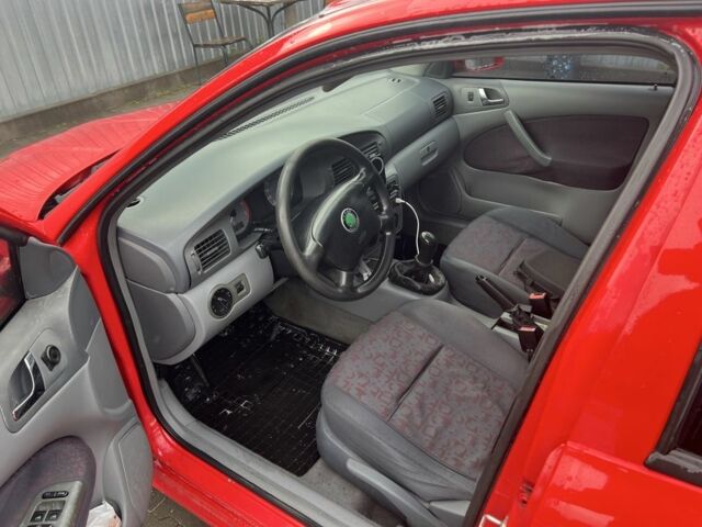 Красный Шкода Октавия, объемом двигателя 1.6 л и пробегом 285 тыс. км за 3600 $, фото 6 на Automoto.ua