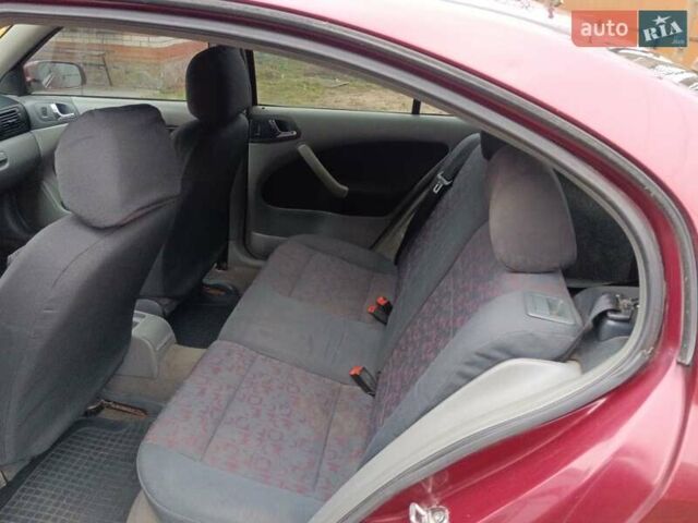 Красный Шкода Октавия, объемом двигателя 1.6 л и пробегом 330 тыс. км за 3600 $, фото 2 на Automoto.ua