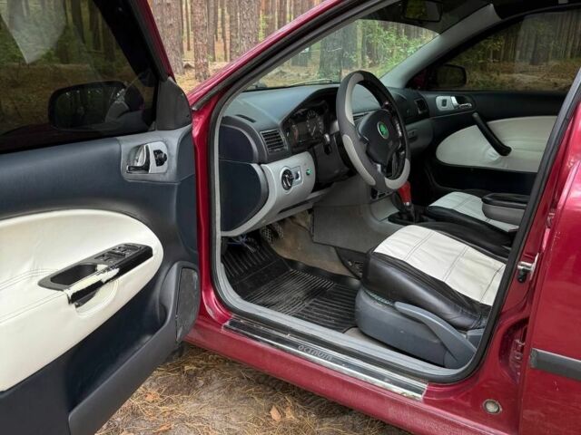 Красный Шкода Октавия, объемом двигателя 1.8 л и пробегом 390 тыс. км за 3200 $, фото 9 на Automoto.ua