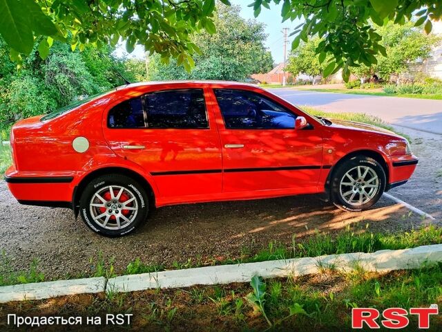 Красный Шкода Октавия, объемом двигателя 1.6 л и пробегом 203 тыс. км за 3700 $, фото 5 на Automoto.ua