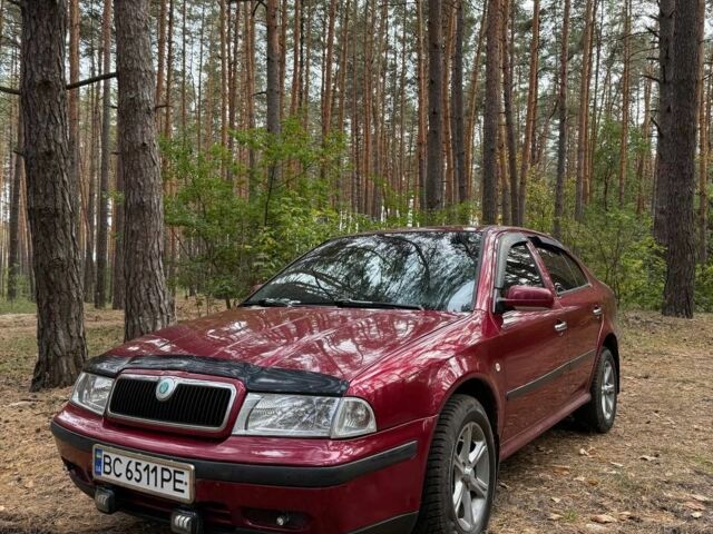 Красный Шкода Октавия, объемом двигателя 1.8 л и пробегом 390 тыс. км за 3500 $, фото 1 на Automoto.ua