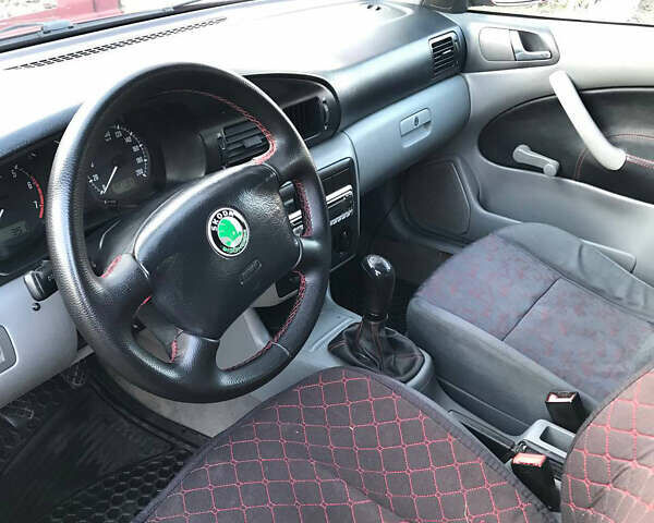 Красный Шкода Октавия, объемом двигателя 1.6 л и пробегом 230 тыс. км за 4050 $, фото 8 на Automoto.ua