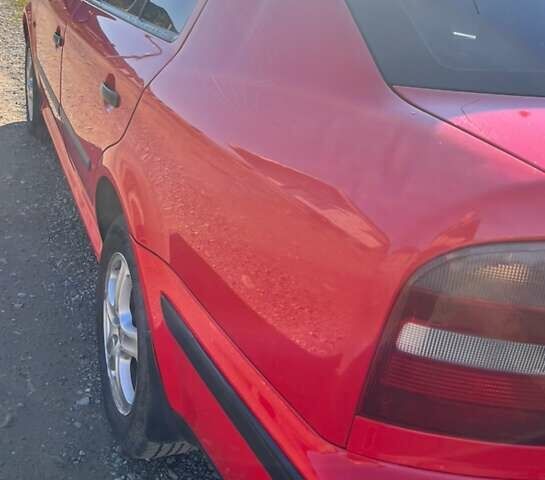 Красный Шкода Октавия, объемом двигателя 1.6 л и пробегом 287 тыс. км за 3200 $, фото 4 на Automoto.ua