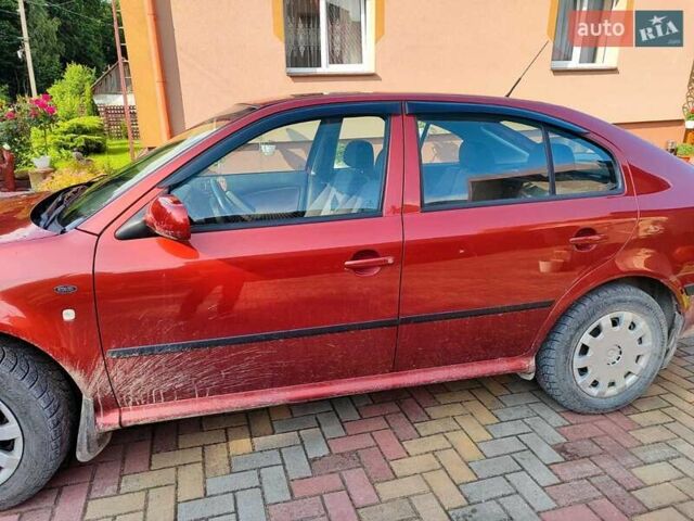 Красный Шкода Октавия, объемом двигателя 1.6 л и пробегом 162 тыс. км за 4500 $, фото 3 на Automoto.ua