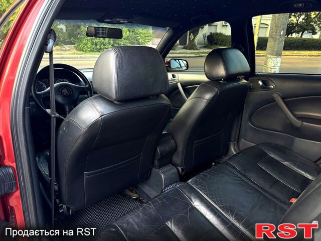 Червоний Шкода Октавія, об'ємом двигуна 1.8 л та пробігом 258 тис. км за 5199 $, фото 12 на Automoto.ua