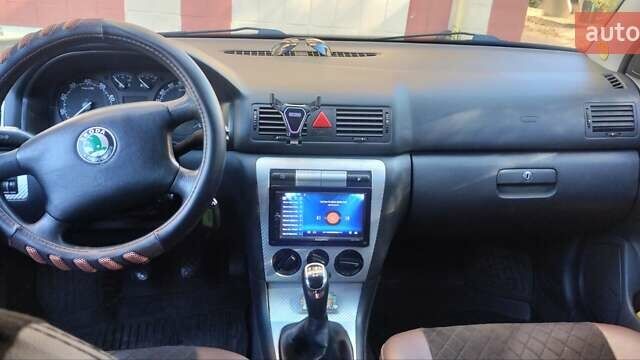Красный Шкода Октавия, объемом двигателя 2 л и пробегом 317 тыс. км за 4300 $, фото 5 на Automoto.ua