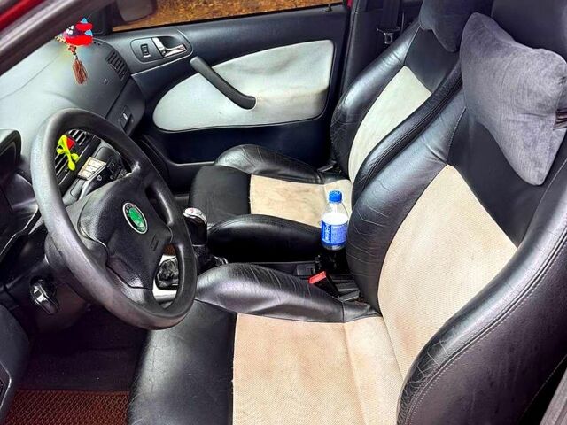 Червоний Шкода Октавія, об'ємом двигуна 1.8 л та пробігом 244 тис. км за 6000 $, фото 9 на Automoto.ua