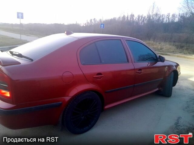 Красный Шкода Октавия, объемом двигателя 1.8 л и пробегом 253 тыс. км за 4400 $, фото 3 на Automoto.ua