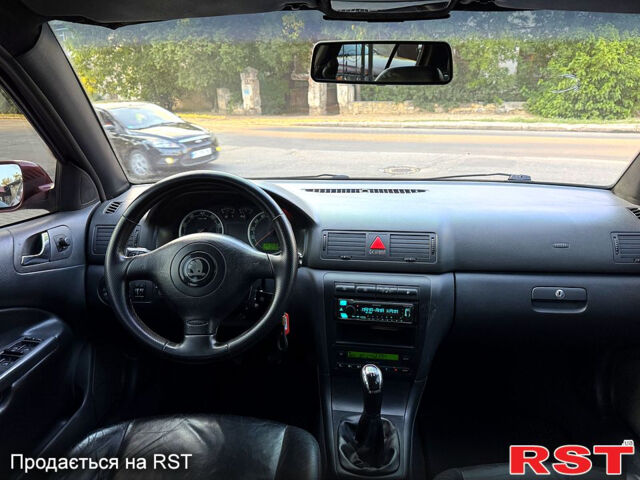 Червоний Шкода Октавія, об'ємом двигуна 1.8 л та пробігом 258 тис. км за 5199 $, фото 8 на Automoto.ua