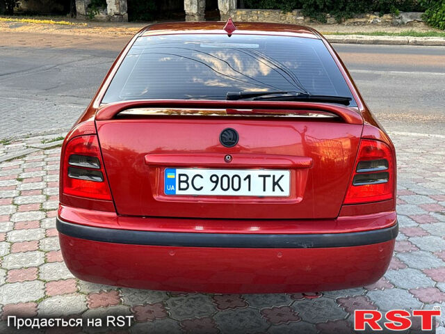 Червоний Шкода Октавія, об'ємом двигуна 1.8 л та пробігом 258 тис. км за 5199 $, фото 5 на Automoto.ua