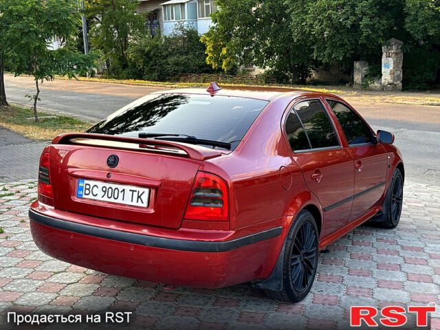 Червоний Шкода Октавія, об'ємом двигуна 1.8 л та пробігом 258 тис. км за 5199 $, фото 4 на Automoto.ua