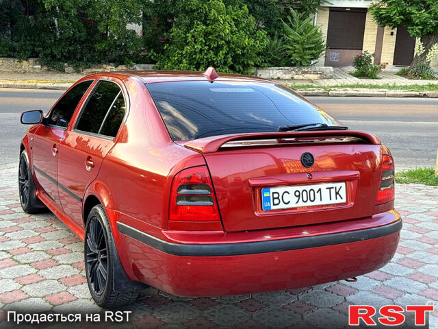 Червоний Шкода Октавія, об'ємом двигуна 1.8 л та пробігом 258 тис. км за 5199 $, фото 6 на Automoto.ua