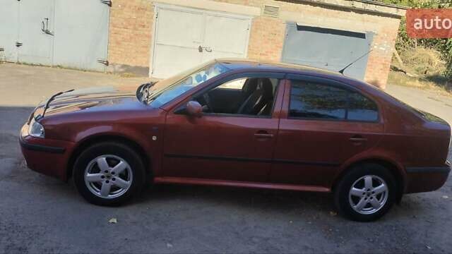Красный Шкода Октавия, объемом двигателя 2 л и пробегом 317 тыс. км за 4300 $, фото 3 на Automoto.ua