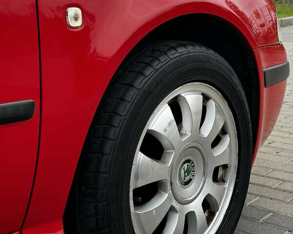 Красный Шкода Октавия, объемом двигателя 1.6 л и пробегом 229 тыс. км за 3599 $, фото 17 на Automoto.ua