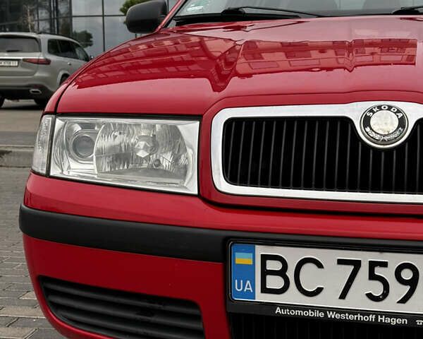 Красный Шкода Октавия, объемом двигателя 1.6 л и пробегом 229 тыс. км за 3599 $, фото 5 на Automoto.ua