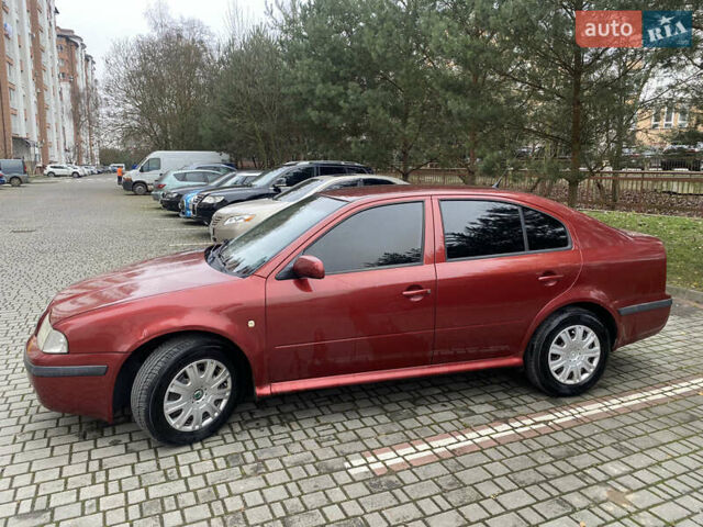 Красный Шкода Октавия, объемом двигателя 1.9 л и пробегом 318 тыс. км за 4300 $, фото 1 на Automoto.ua