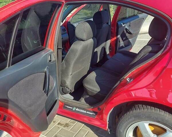 Красный Шкода Октавия, объемом двигателя 1.6 л и пробегом 225 тыс. км за 4999 $, фото 12 на Automoto.ua