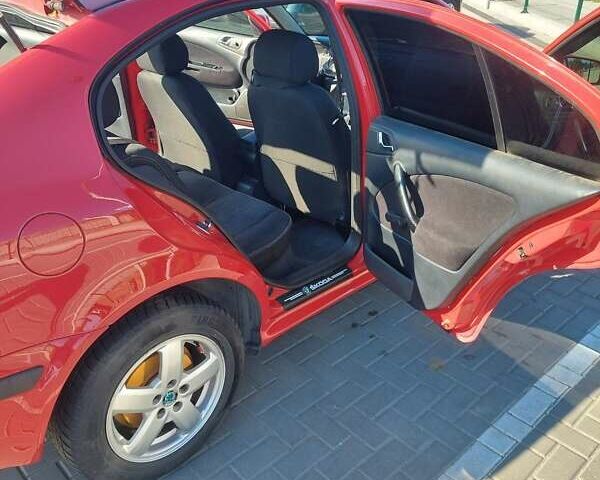 Красный Шкода Октавия, объемом двигателя 1.6 л и пробегом 225 тыс. км за 4999 $, фото 16 на Automoto.ua