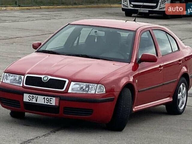 Красный Шкода Октавия, объемом двигателя 1.6 л и пробегом 225 тыс. км за 4999 $, фото 1 на Automoto.ua