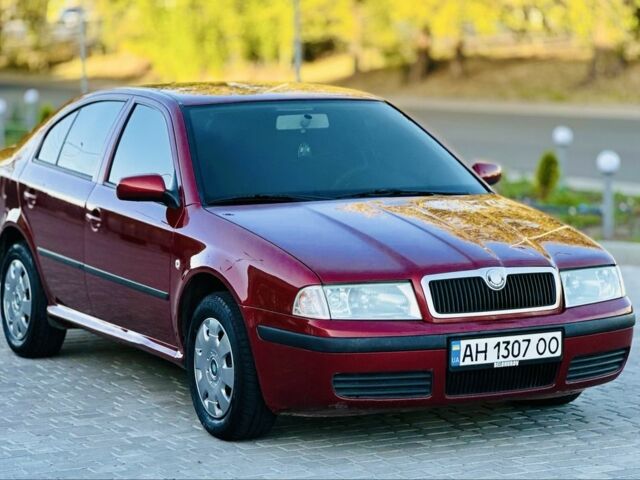 Красный Шкода Октавия, объемом двигателя 1.6 л и пробегом 320 тыс. км за 3999 $, фото 1 на Automoto.ua