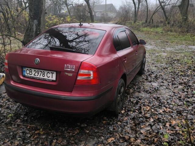 Красный Шкода Октавия, объемом двигателя 1.6 л и пробегом 245 тыс. км за 5800 $, фото 3 на Automoto.ua