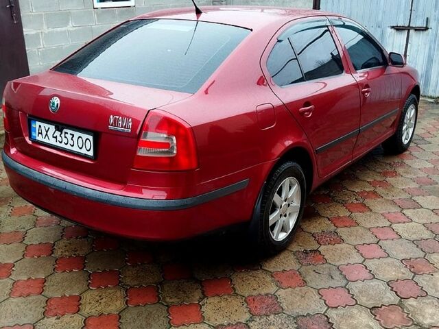 Красный Шкода Октавия, объемом двигателя 1.6 л и пробегом 333 тыс. км за 4999 $, фото 1 на Automoto.ua