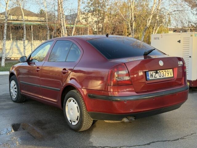 Красный Шкода Октавия, объемом двигателя 2 л и пробегом 100 тыс. км за 2950 $, фото 7 на Automoto.ua