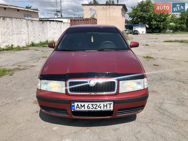 Красный Шкода Октавия, объемом двигателя 1.6 л и пробегом 290 тыс. км за 4099 $, фото 7 на Automoto.ua