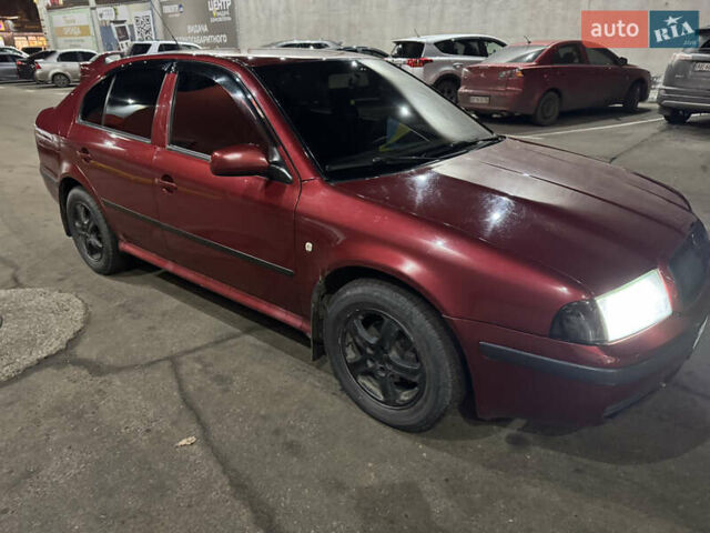 Червоний Шкода Октавія, об'ємом двигуна 1.6 л та пробігом 219 тис. км за 5600 $, фото 1 на Automoto.ua