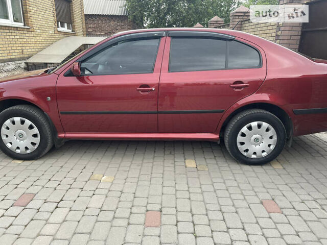 Красный Шкода Октавия, объемом двигателя 1.6 л и пробегом 96 тыс. км за 7899 $, фото 3 на Automoto.ua