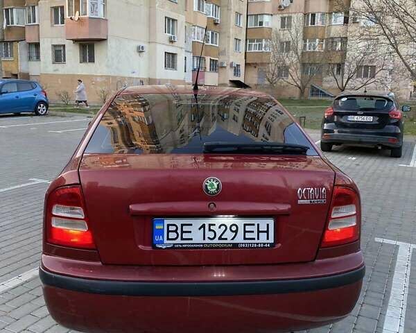 Красный Шкода Октавия, объемом двигателя 1.6 л и пробегом 222 тыс. км за 5250 $, фото 5 на Automoto.ua