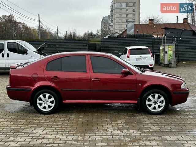 Красный Шкода Октавия, объемом двигателя 1.6 л и пробегом 225 тыс. км за 4750 $, фото 5 на Automoto.ua