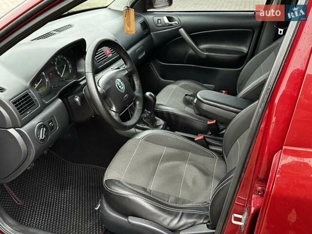 Красный Шкода Октавия, объемом двигателя 1.6 л и пробегом 225 тыс. км за 4750 $, фото 12 на Automoto.ua