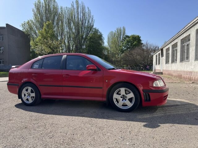 Красный Шкода Октавия, объемом двигателя 1.8 л и пробегом 159 тыс. км за 5990 $, фото 2 на Automoto.ua