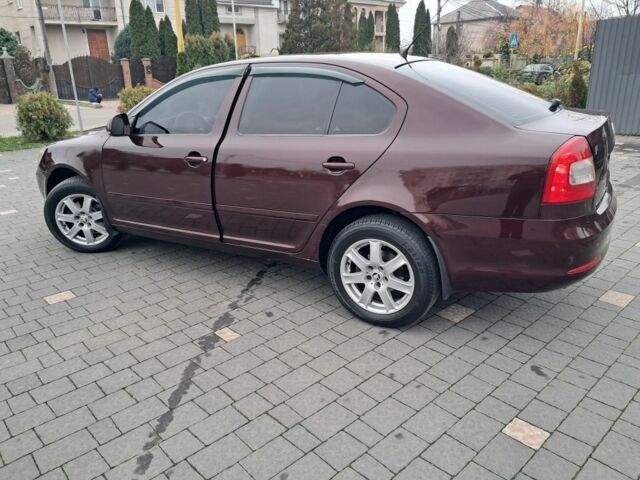 Красный Шкода Октавия, объемом двигателя 1.6 л и пробегом 242 тыс. км за 7300 $, фото 1 на Automoto.ua