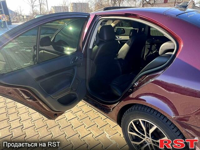 Червоний Шкода Октавія, об'ємом двигуна 1.8 л та пробігом 256 тис. км за 9500 $, фото 2 на Automoto.ua