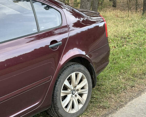 Красный Шкода Октавия, объемом двигателя 1.2 л и пробегом 360 тыс. км за 5499 $, фото 14 на Automoto.ua