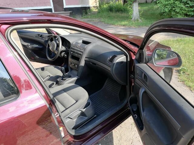 Червоний Шкода Октавія, об'ємом двигуна 1.2 л та пробігом 350 тис. км за 5000 $, фото 10 на Automoto.ua