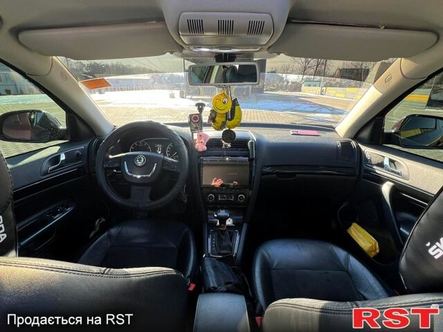 Червоний Шкода Октавія, об'ємом двигуна 1.8 л та пробігом 256 тис. км за 9500 $, фото 1 на Automoto.ua