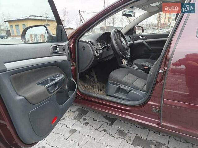 Красный Шкода Октавия, объемом двигателя 1.8 л и пробегом 170 тыс. км за 8000 $, фото 7 на Automoto.ua
