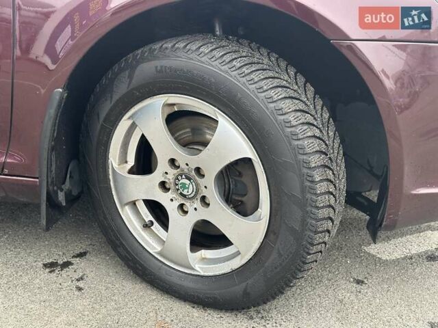 Красный Шкода Октавия, объемом двигателя 1.8 л и пробегом 168 тыс. км за 7490 $, фото 11 на Automoto.ua