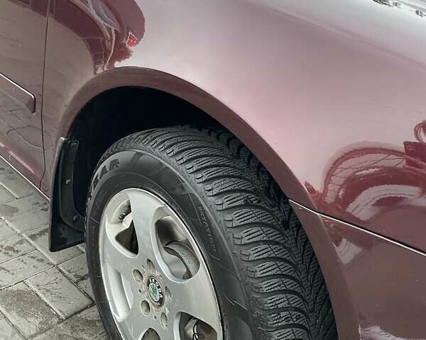 Красный Шкода Октавия, объемом двигателя 1.8 л и пробегом 167 тыс. км за 8200 $, фото 30 на Automoto.ua