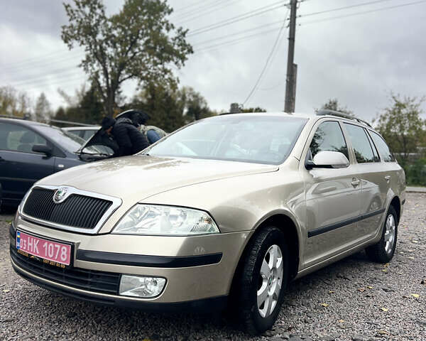 Жовтий Шкода Октавія, об'ємом двигуна 1.6 л та пробігом 213 тис. км за 6450 $, фото 1 на Automoto.ua