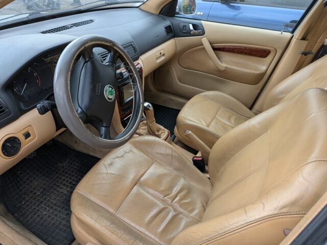 Серый Шкода Октавия, объемом двигателя 1.8 л и пробегом 260 тыс. км за 4011 $, фото 5 на Automoto.ua