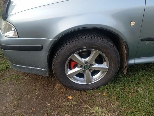 Серый Шкода Октавия, объемом двигателя 1.6 л и пробегом 362 тыс. км за 4400 $, фото 15 на Automoto.ua