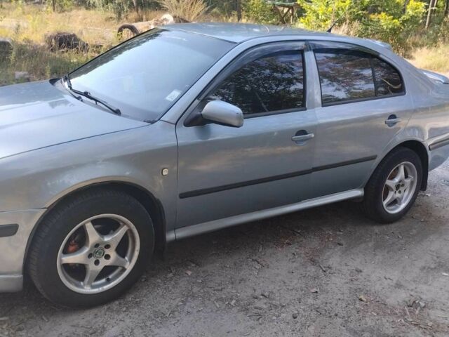 Серый Шкода Октавия, объемом двигателя 1.6 л и пробегом 362 тыс. км за 4400 $, фото 3 на Automoto.ua