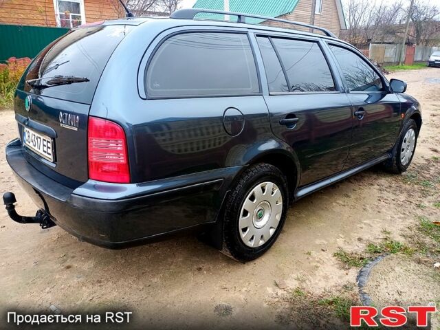 Серый Шкода Октавия, объемом двигателя 1.6 л и пробегом 300 тыс. км за 4000 $, фото 4 на Automoto.ua