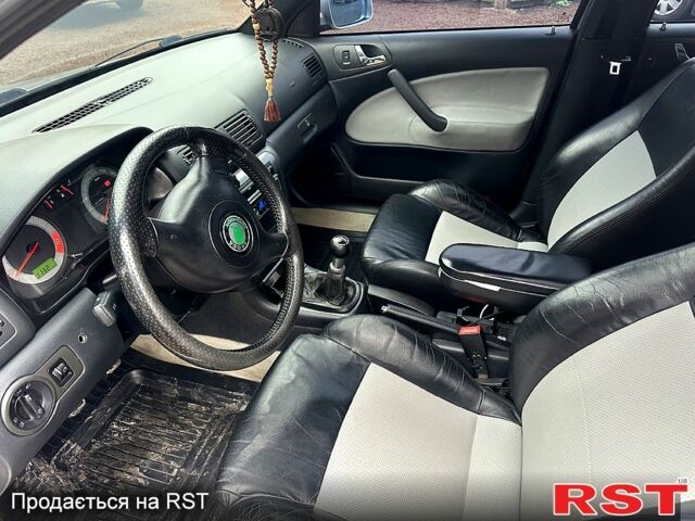 Серый Шкода Октавия, объемом двигателя 1.8 л и пробегом 176 тыс. км за 5300 $, фото 7 на Automoto.ua