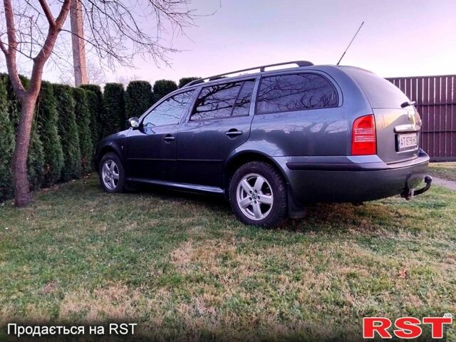 Сірий Шкода Октавія, об'ємом двигуна 2 л та пробігом 245 тис. км за 4950 $, фото 2 на Automoto.ua