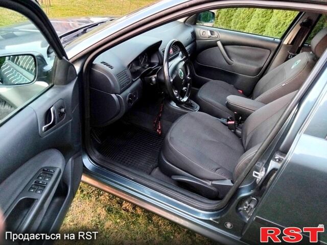 Сірий Шкода Октавія, об'ємом двигуна 2 л та пробігом 245 тис. км за 4950 $, фото 3 на Automoto.ua